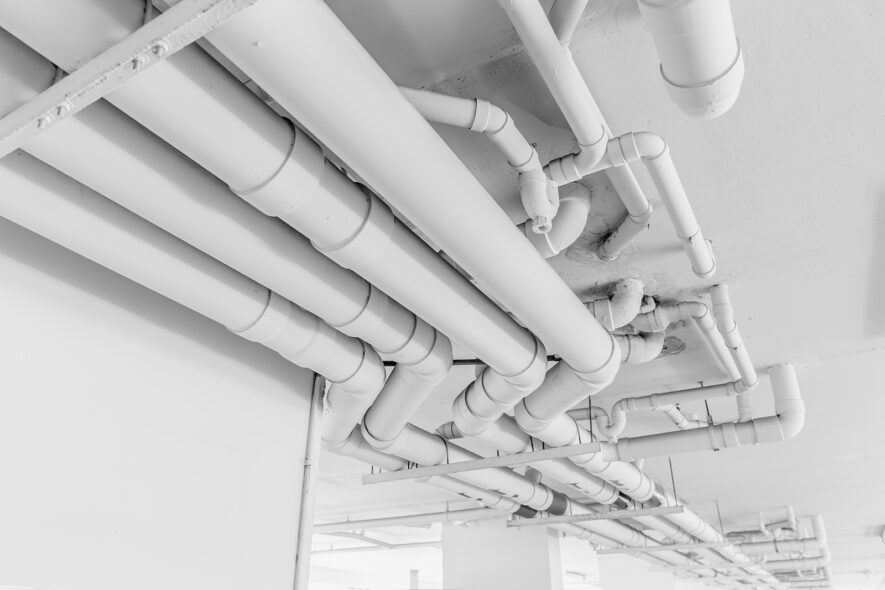 How Aging Plumbing Behind Walls Affects Remodel Plans and Long-Term System Reliability
