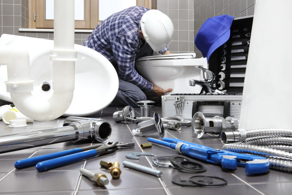 Licensed emergency plumber arriving at Cypress TX home for urgent pipe repair